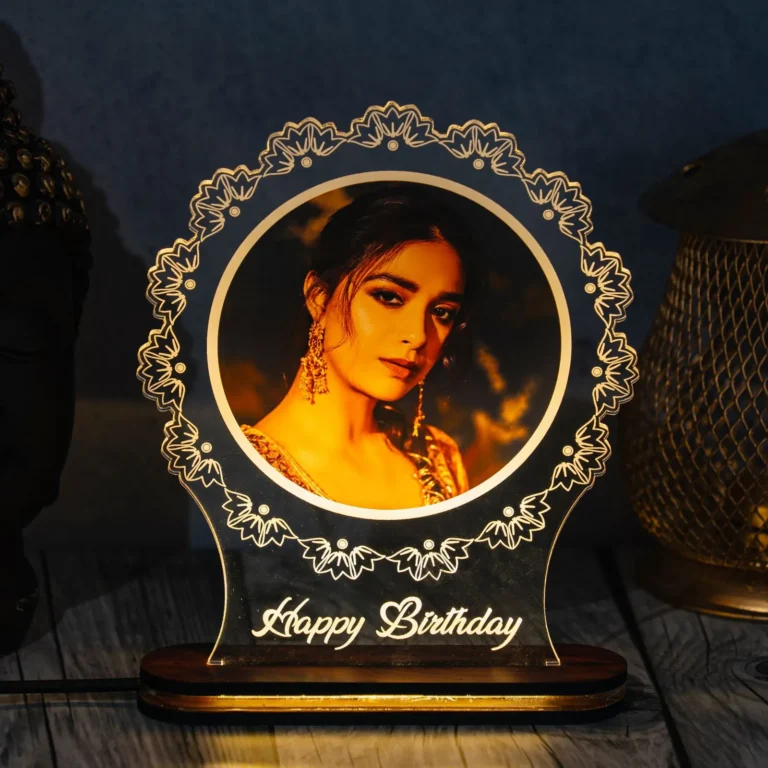 Custom acrylic LED photo frame with personalized engraving and vibrant edge lighting. Perfect gift for birthdays, anniversaries, or home décor.