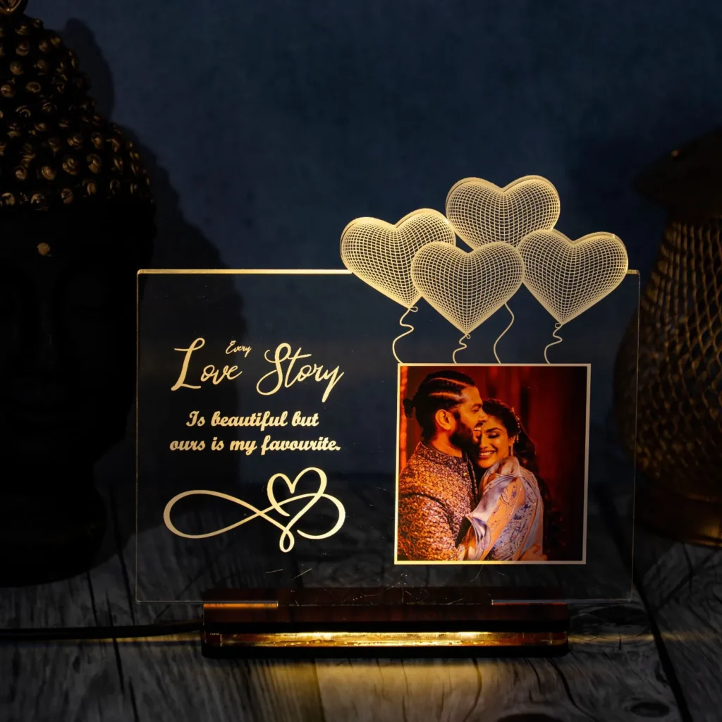 Custom acrylic LED photo frame with personalized engraving and vibrant edge lighting. Perfect gift for birthdays, anniversaries, or home décor.